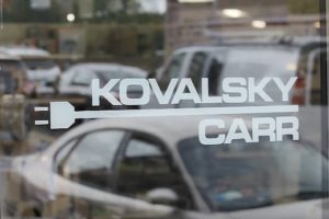 Kovalsky Carr logo on glass door