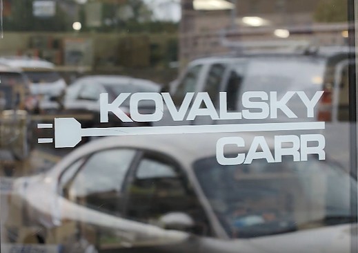 Kovalsky Carr logo on glass door