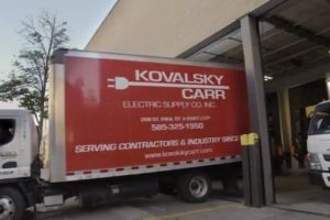 Kovalsky Carr delivery truck with logo on side